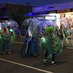 The annual festival parade brings residents to the main street once a year