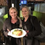 A couple of Wests members get into the spirit of the Parma for a Farmer fundraising drive.